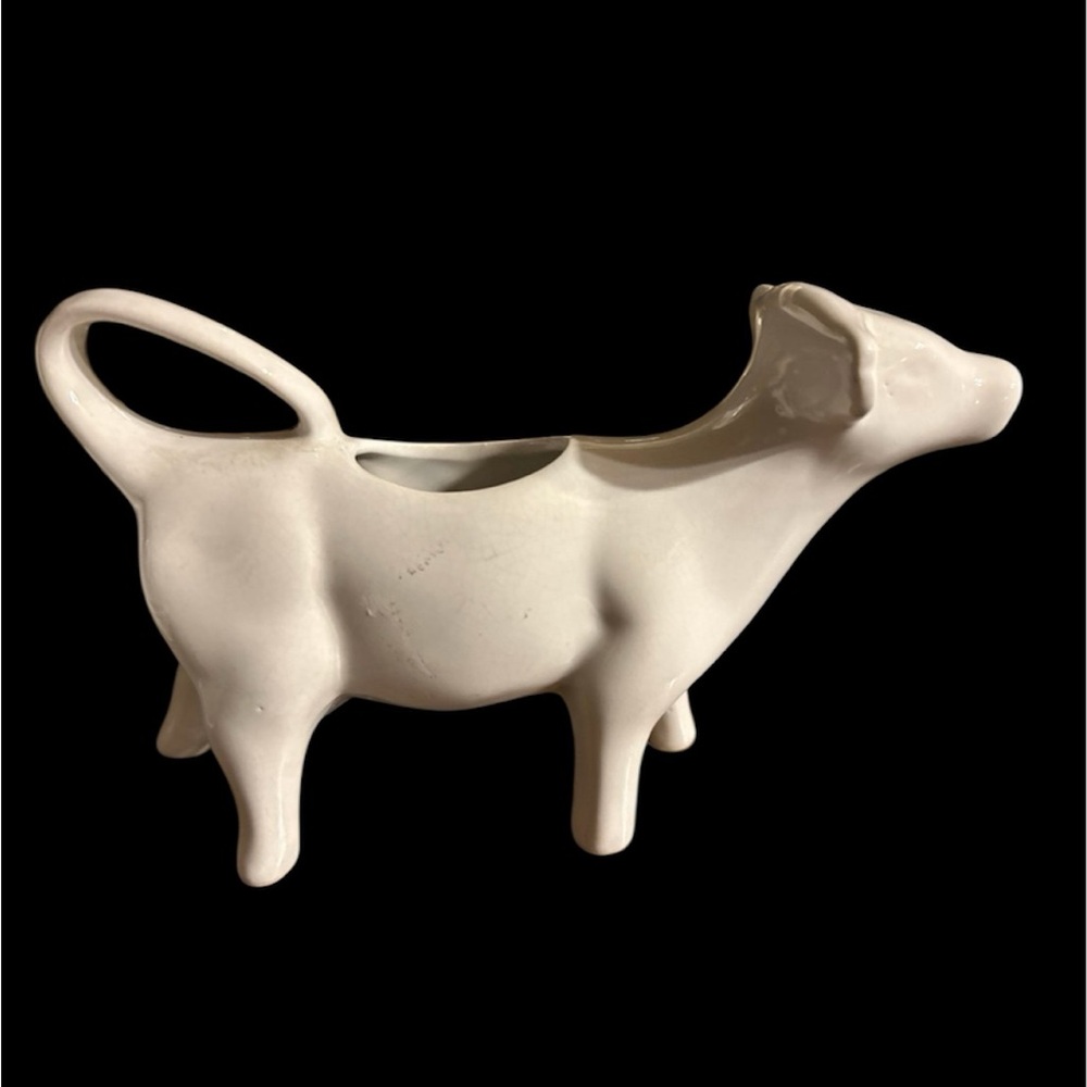 Elegant Cream Ceramic Cow Figurine